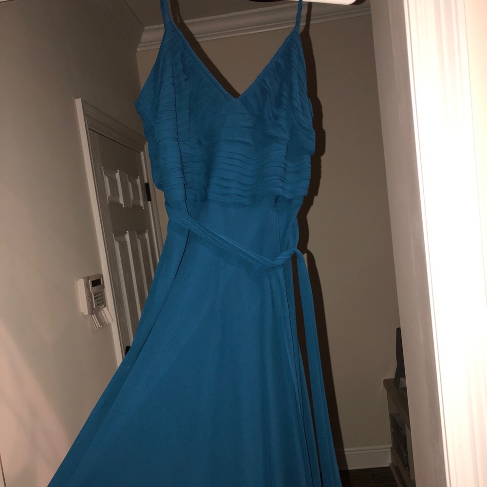 Turquoise silk cocktail dress.
